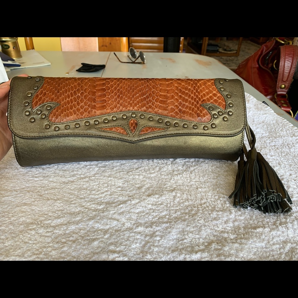 Statement boho leather and snakeskin clutch